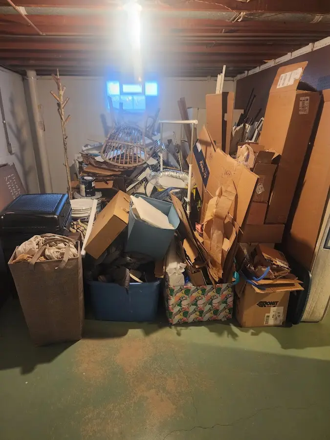 Roll-off dumpster container at job site for Construction Dumpster Rental in Elm Springs